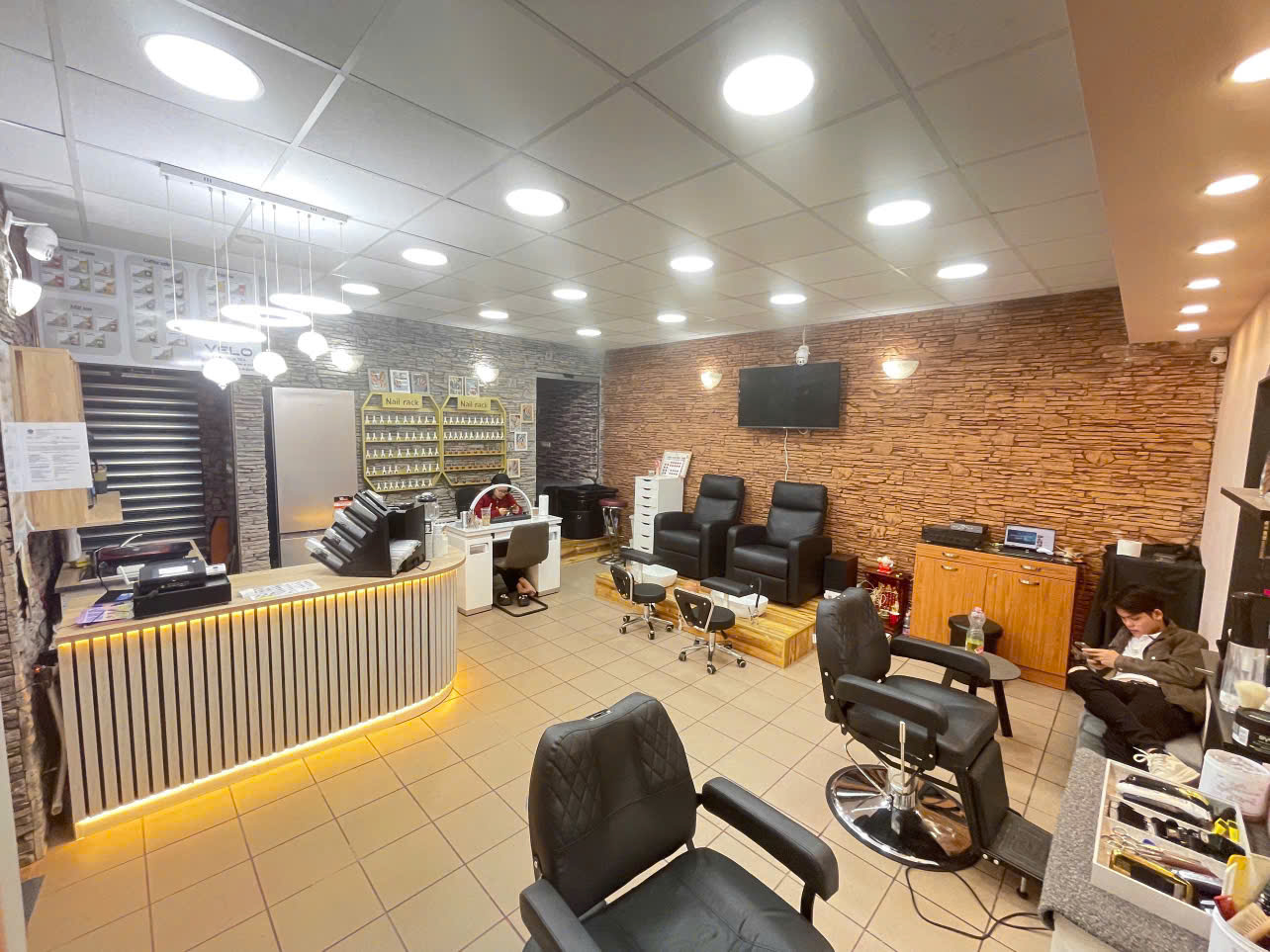 Salon interior with nail and haircut stations