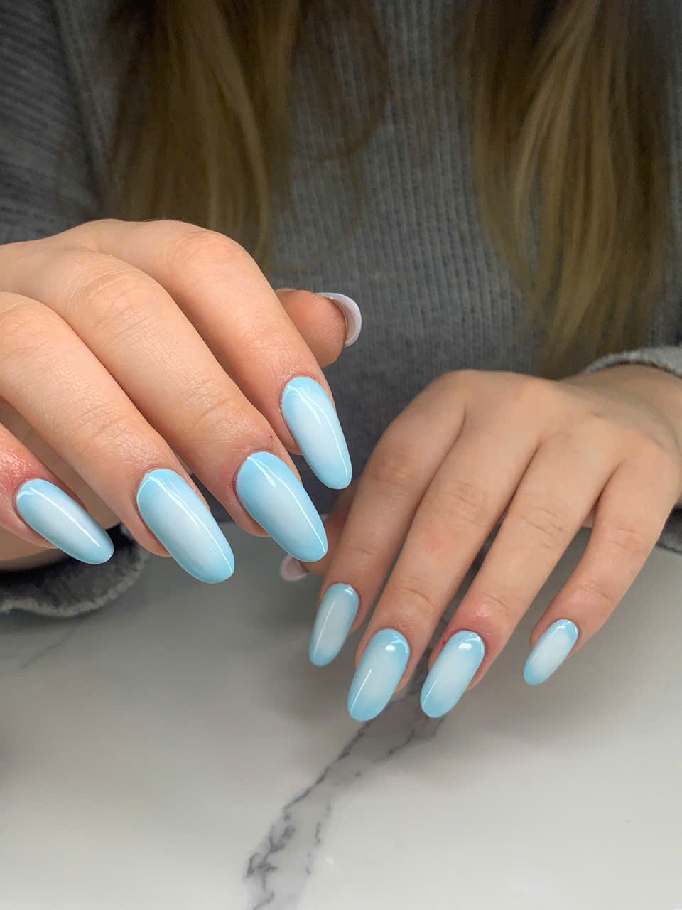 Light blue gel polish nails