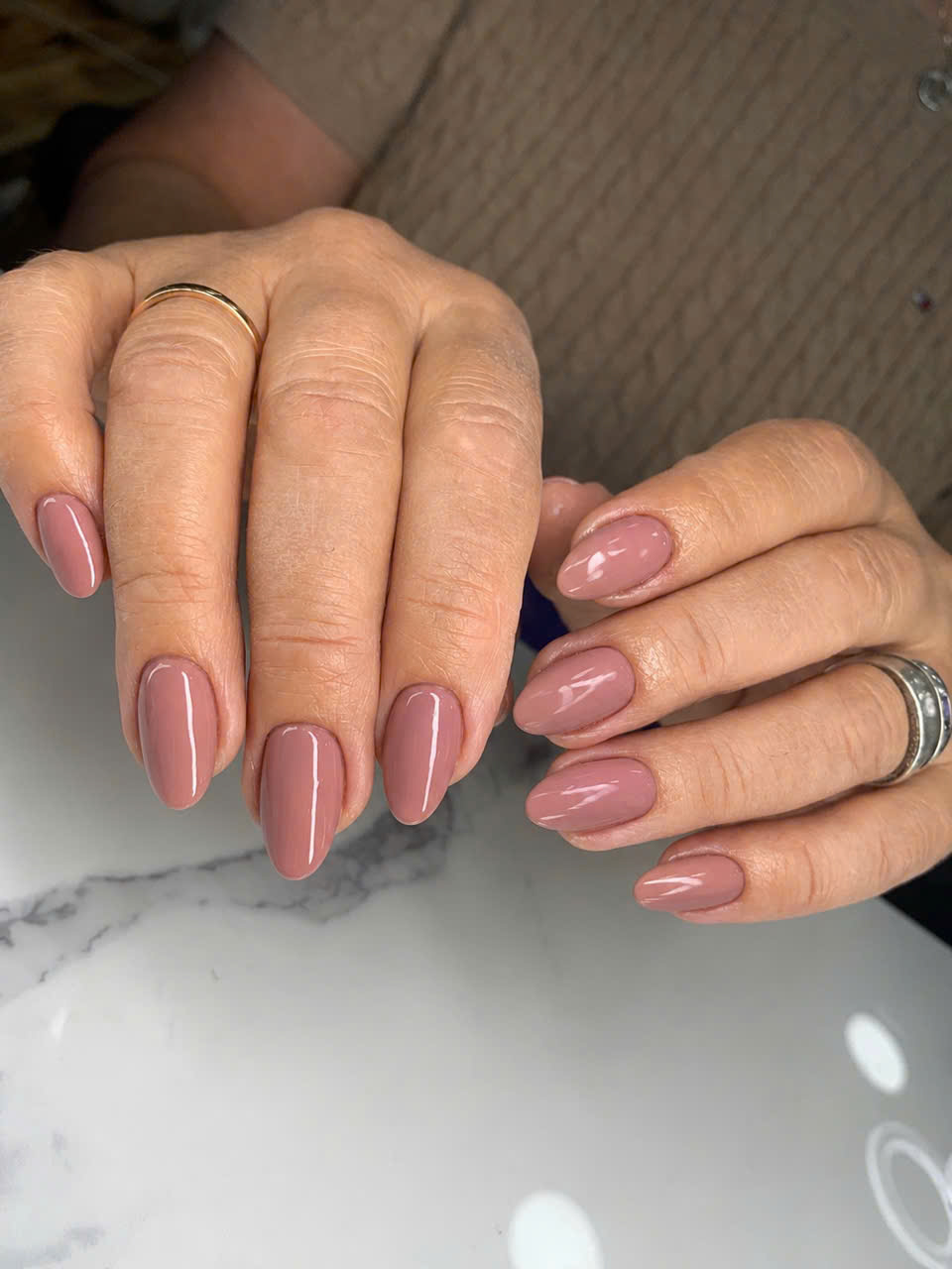 Natural pink gel polish nails